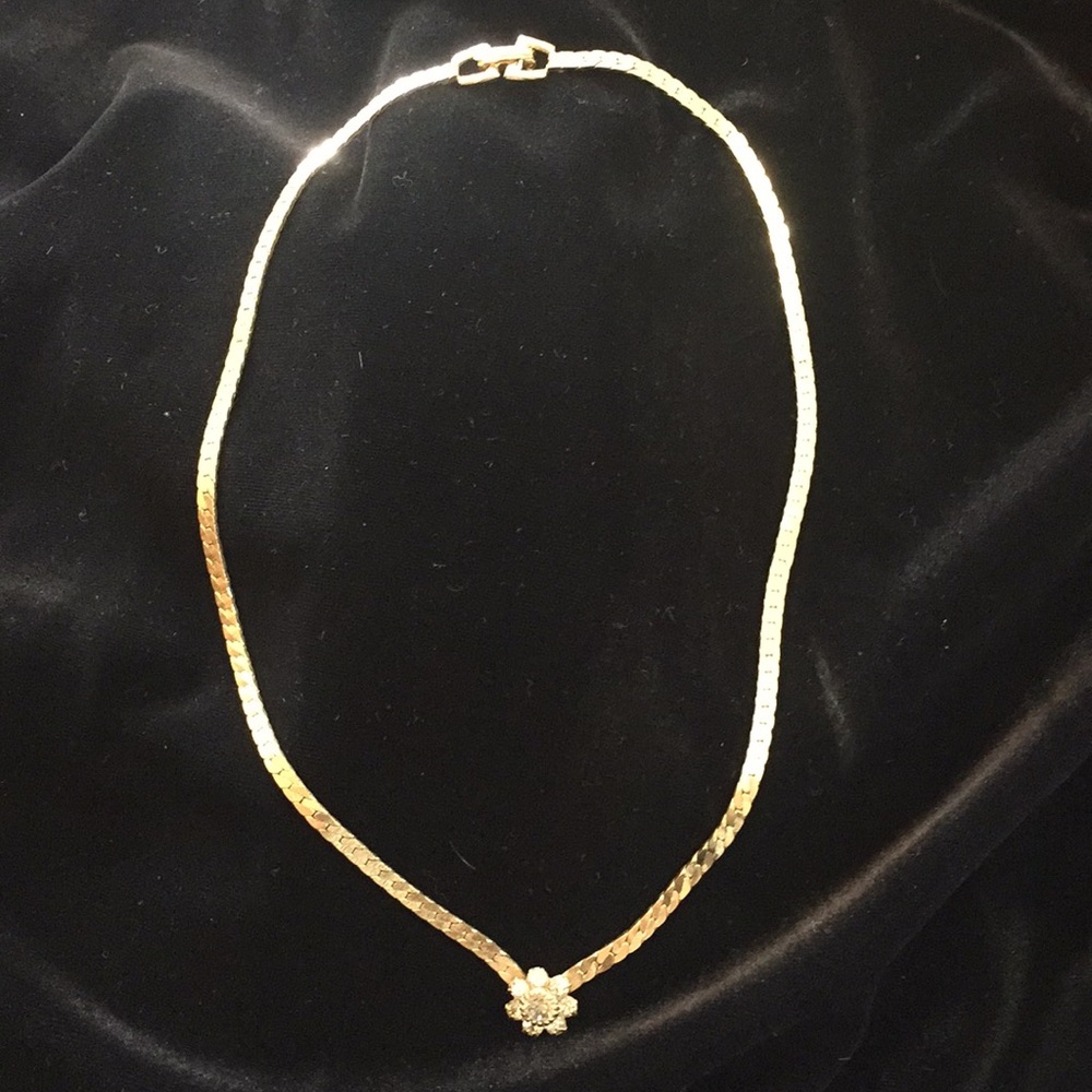 Gold serpentine flat with diamond cluster